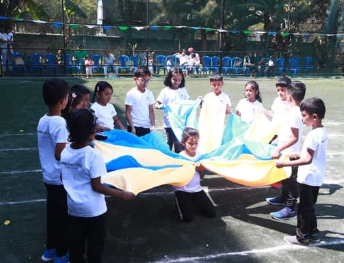 Children in a project-based learning activity at Adra